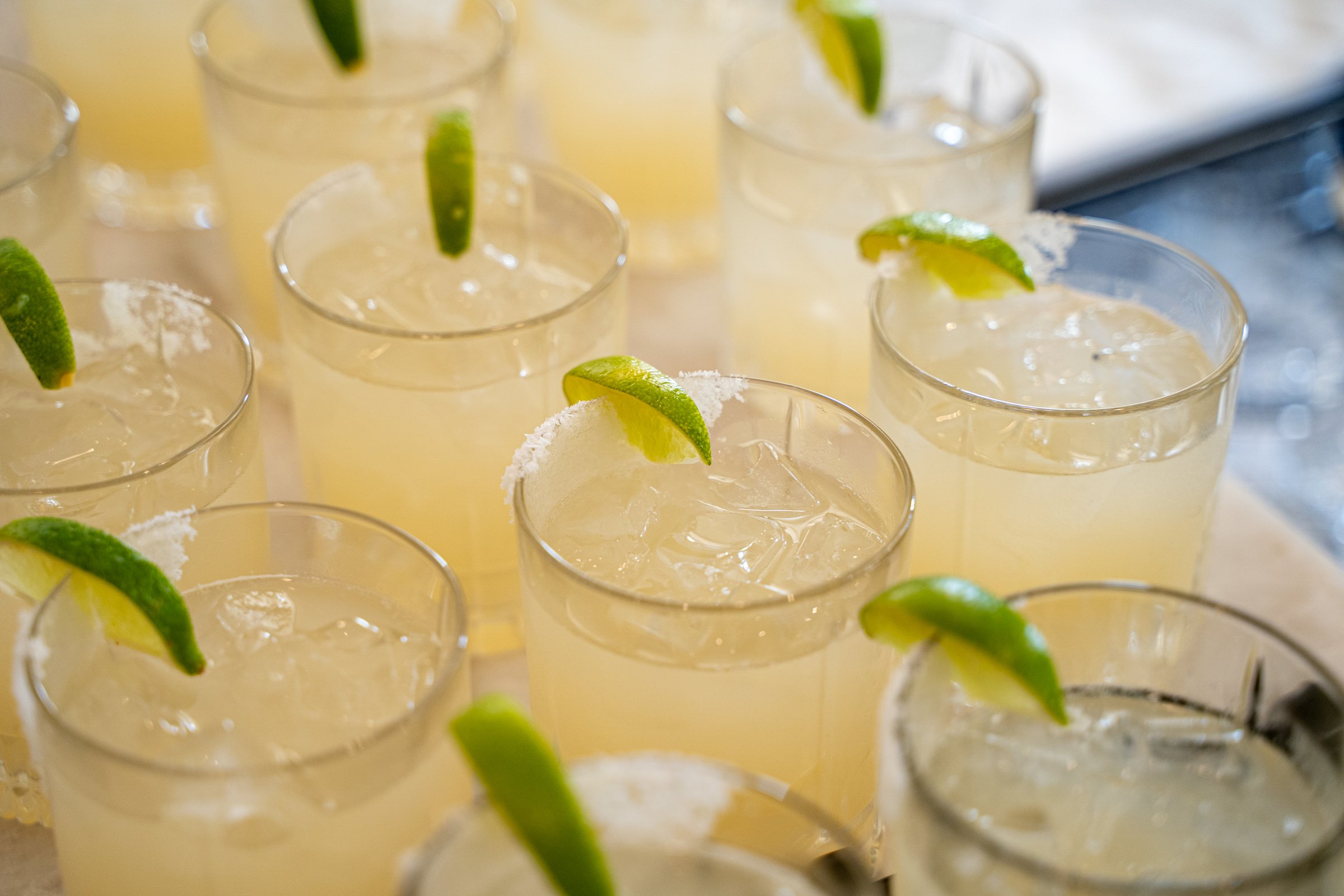 Close up of margarita cocktails with lime and salt.