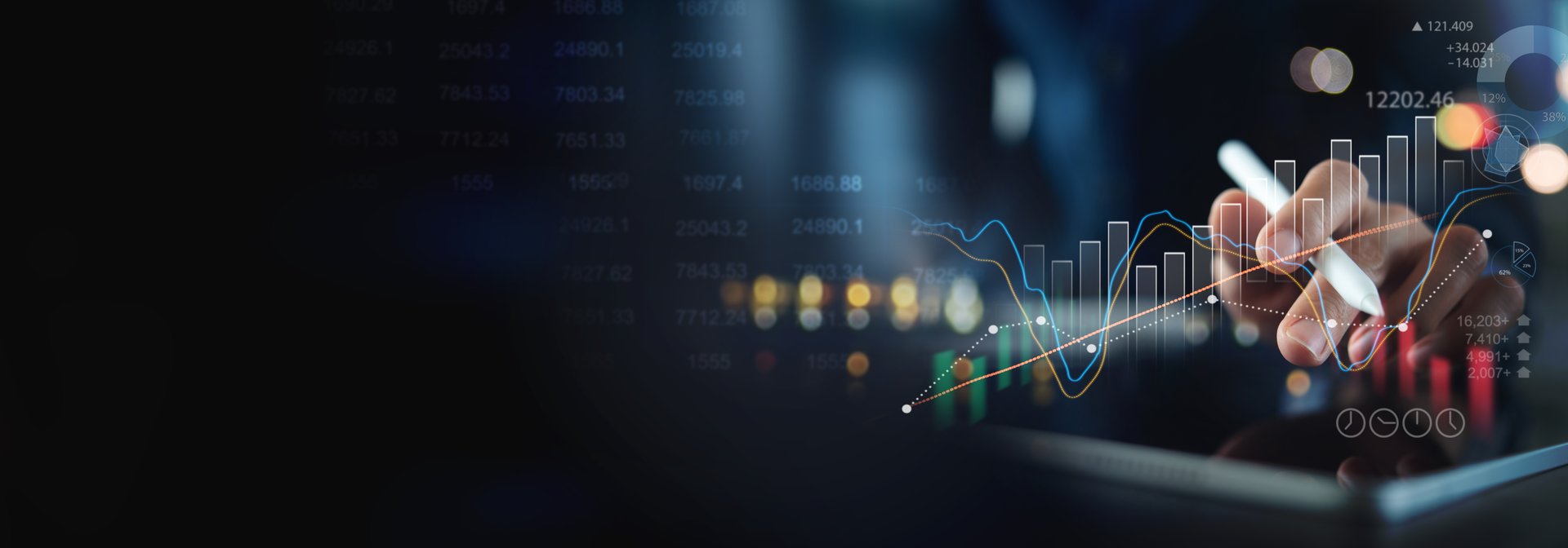 Business, finance and investment concept. Businessman using digital tablet analyzing and calculating financial data with economic graph growth chart, Business strategy and planning. market research