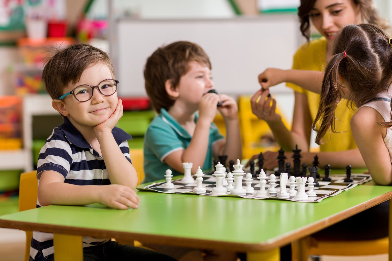 Childs playing chess.