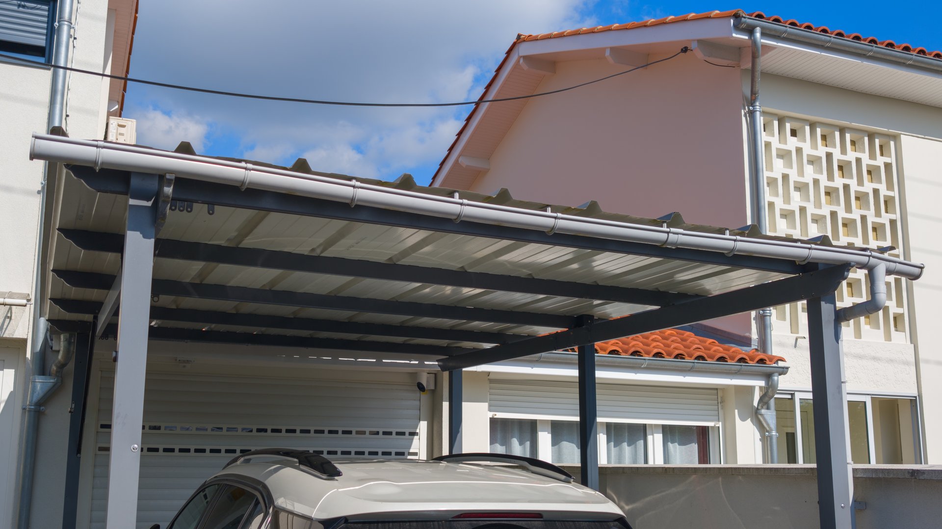 home carport steel front home facade garage house parked place car patio pergola roof