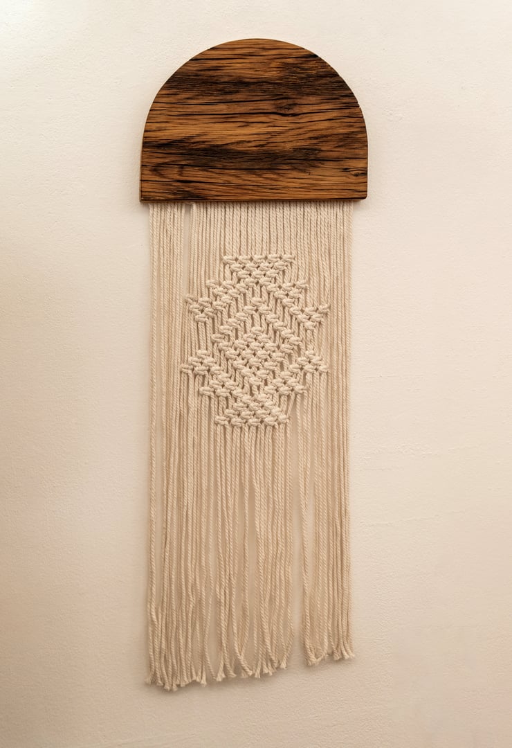 Minimal macrame wall hanging with wooden arch accent