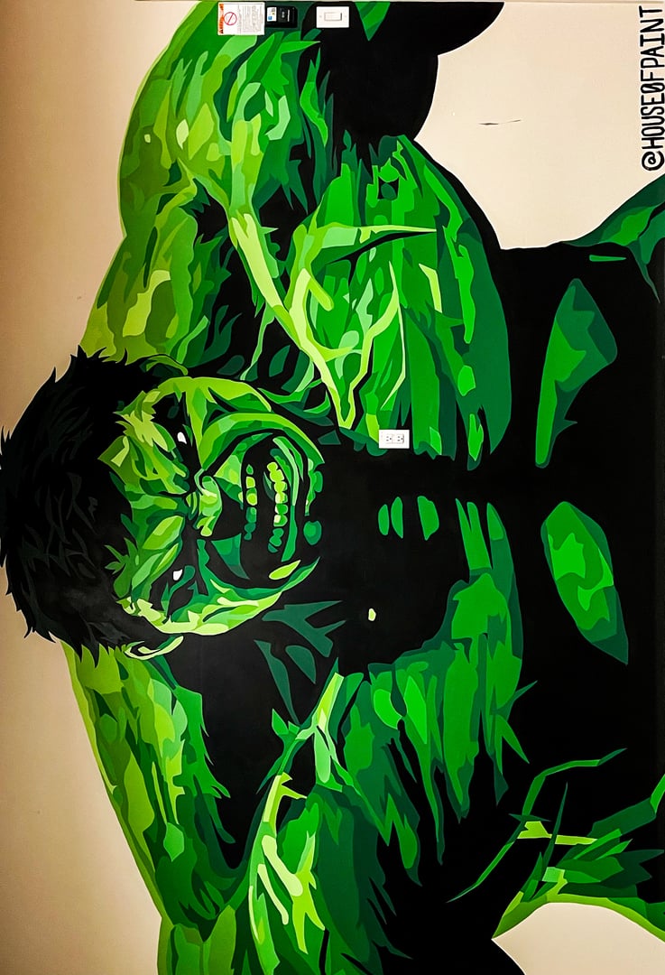 Colorful mural of a muscular green character flexing, with a fierce expression, signed by @HANSEPAINT.