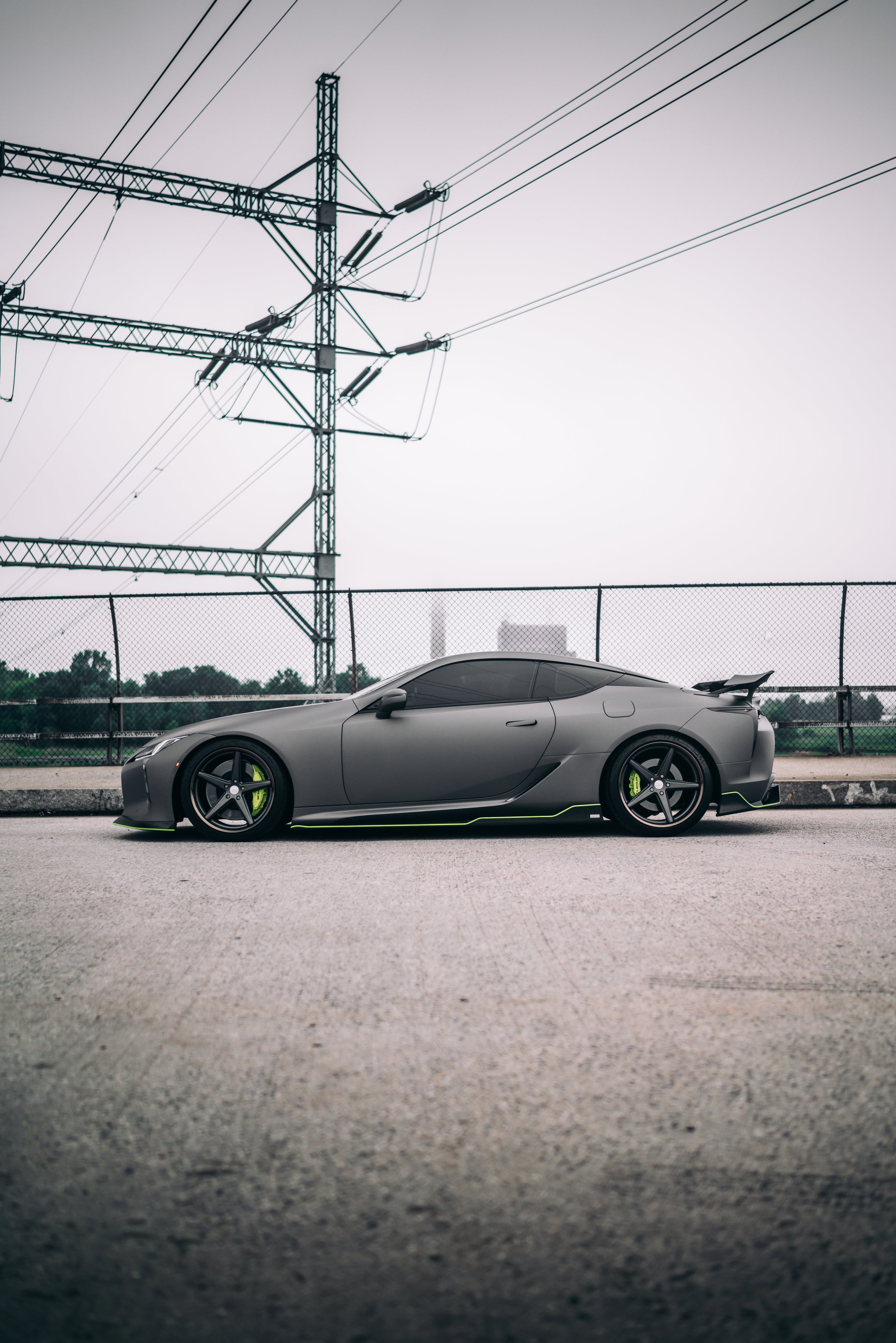 LA, CA, USAJuly 1, 2025Lexus LC500 parked showing the drivers side with powerlines overhead