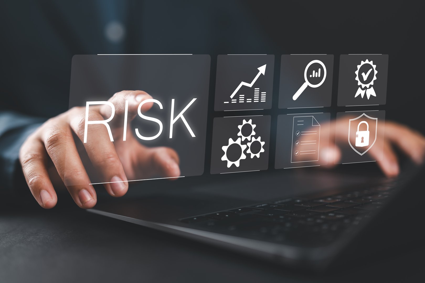 Risk management concept, risk assessment. Businessman using laptop to business and personal planning for risk mitigation with information and decision.