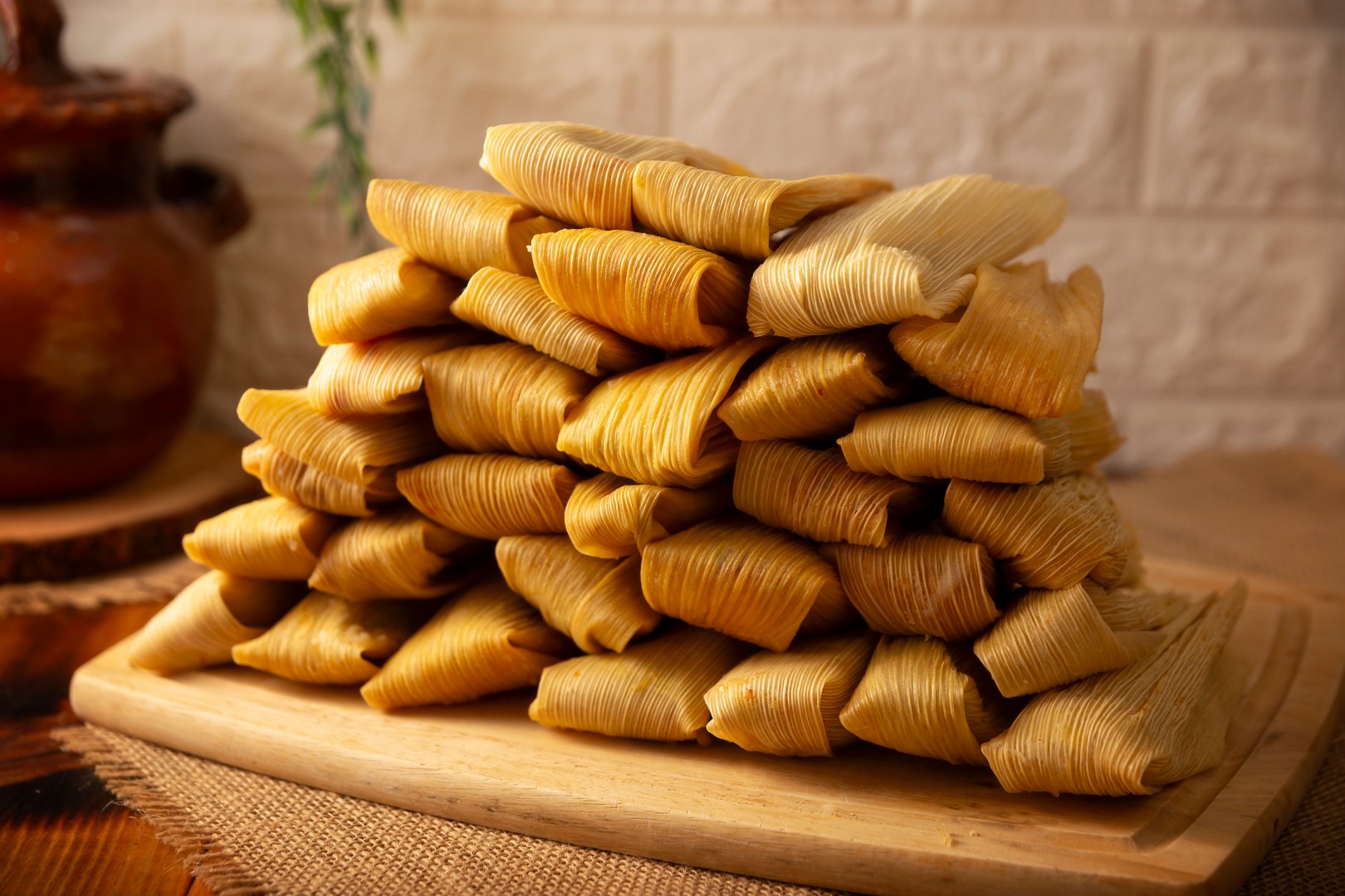 Tamales. Traditional dish typical of Mexico and some Latin American countries. Corn dough wrapped in corn leaves. The tamales are steamed.