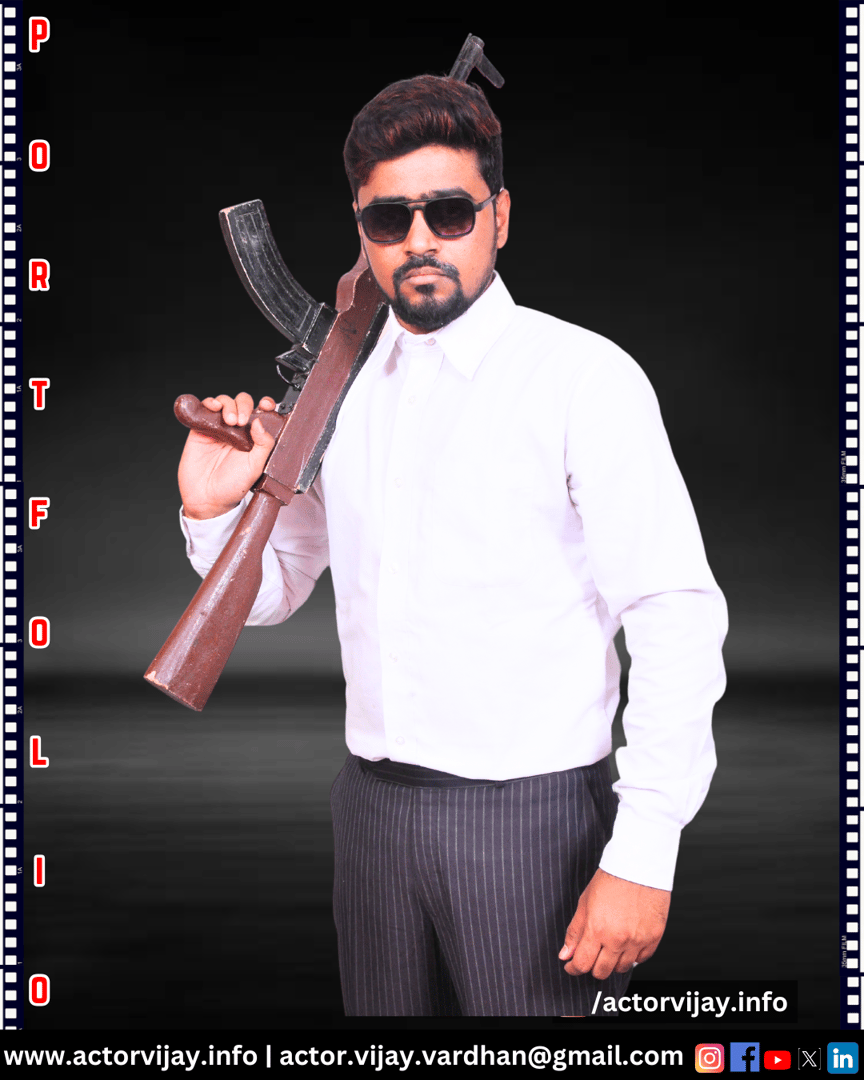 Man in a white shirt and sunglasses holding a prop gun, posing in front of a dark background with "Portfolio" text.