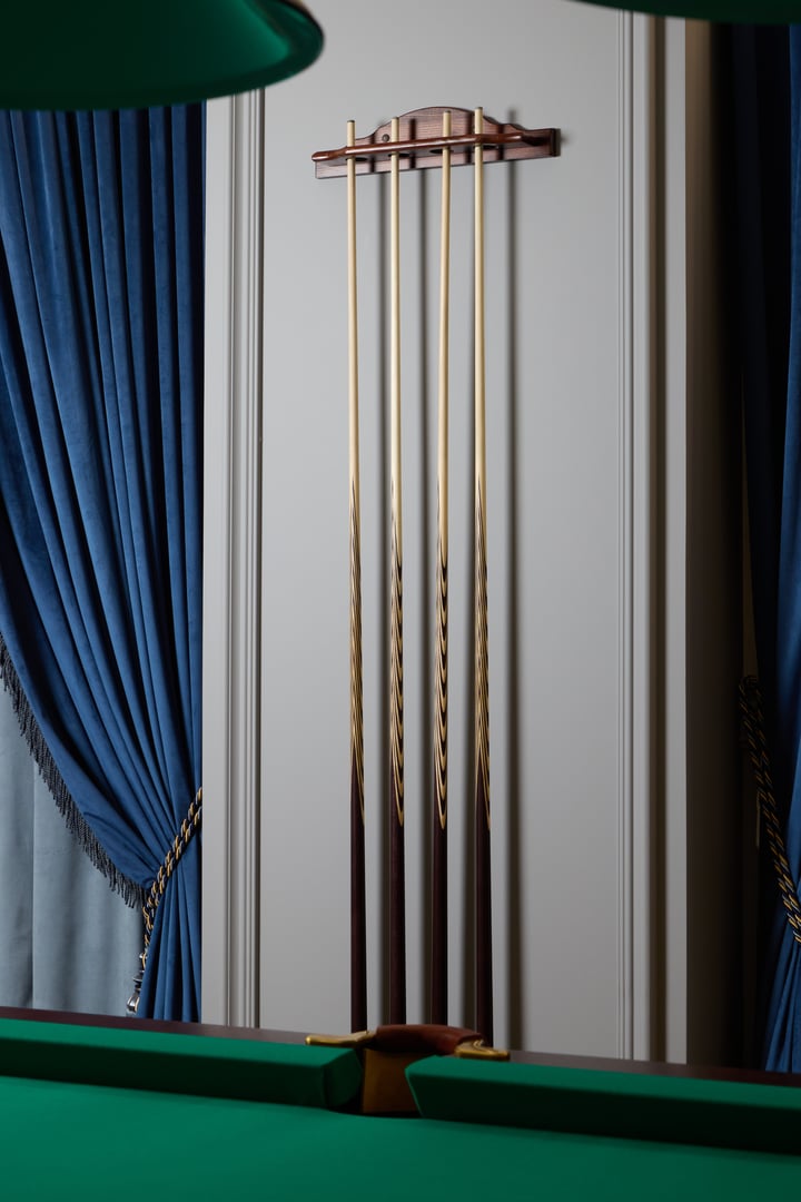 A stylish billiard cue rack serves as an exquisite piece that showcases elegance in a refined environment