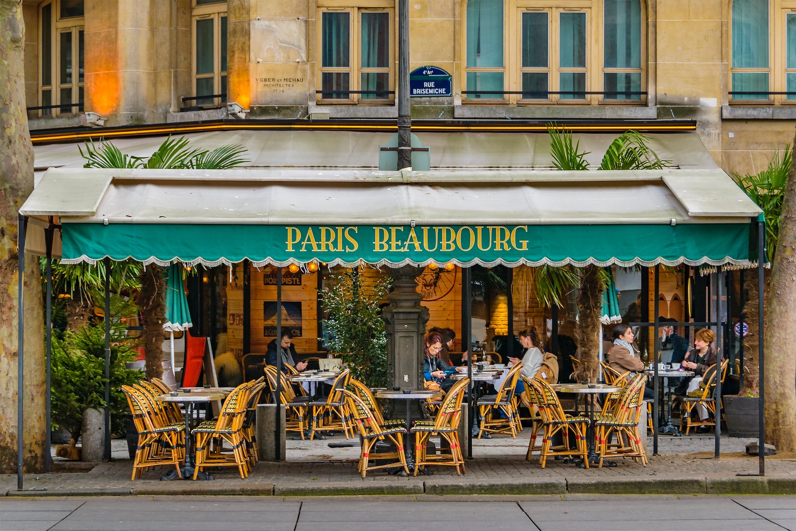 PARIS, FRANCE, JANUARY - 2020 - Coffe restaurant exterior facade, at Paris city, France