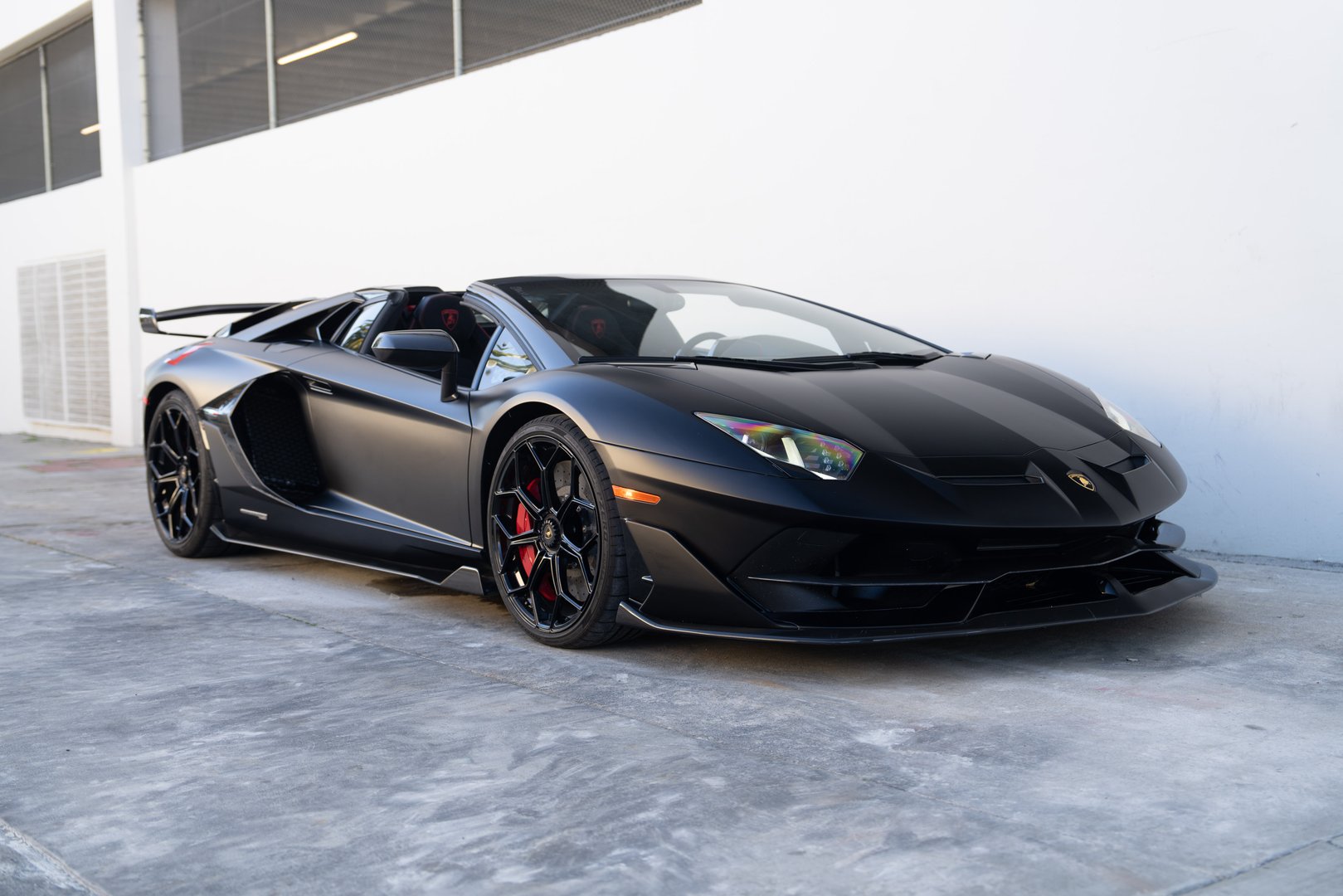 Lamborghini Aventador SVJ parked showing the front of the car