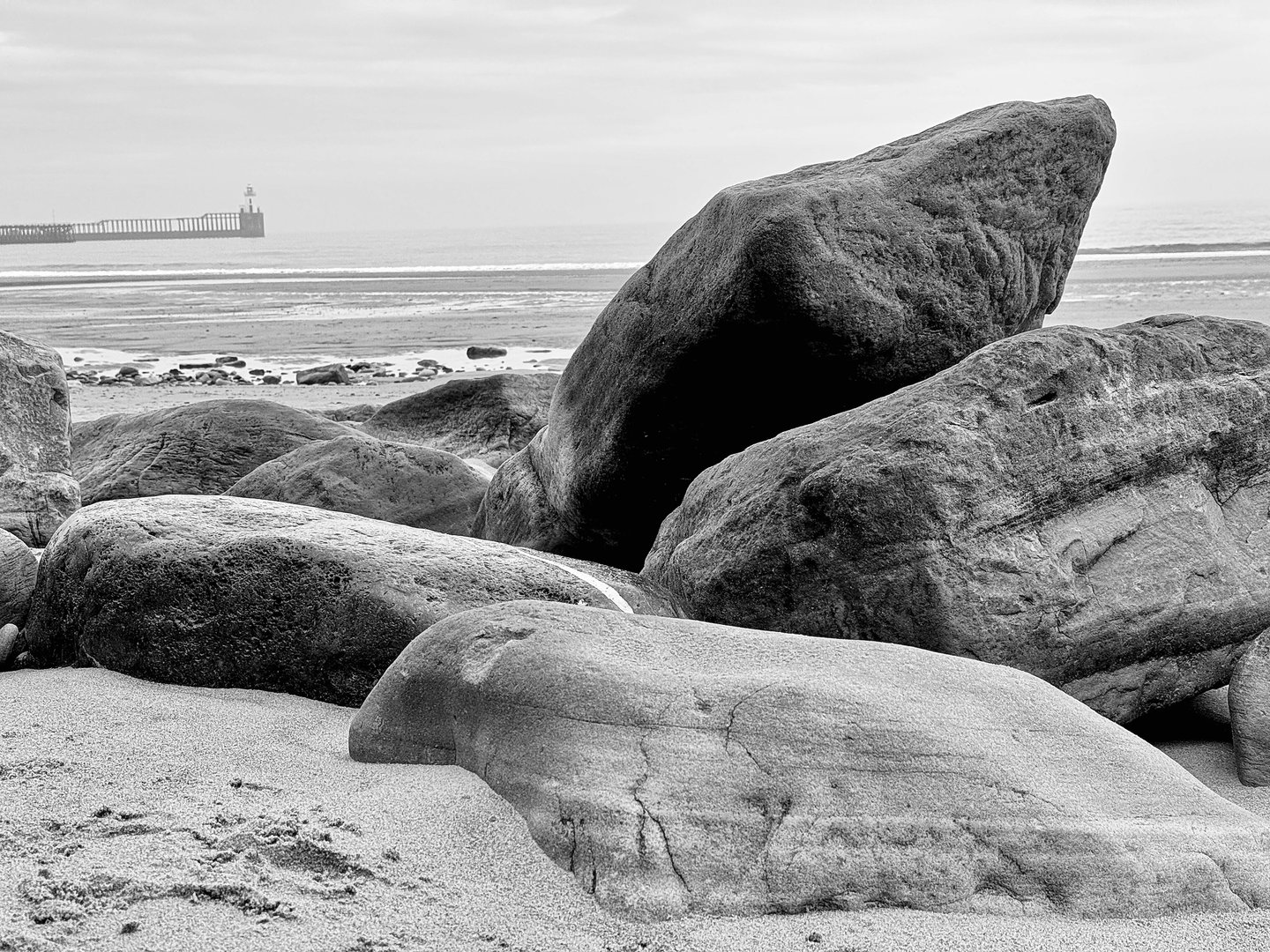 Large rock formations on a beach at Blyth in Northumberland