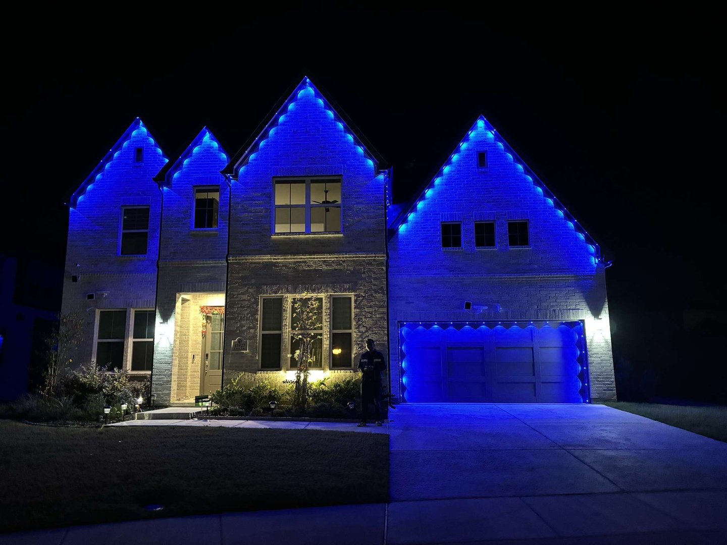 Professional Christmas lighting installation showcasing beautiful holiday home decoration