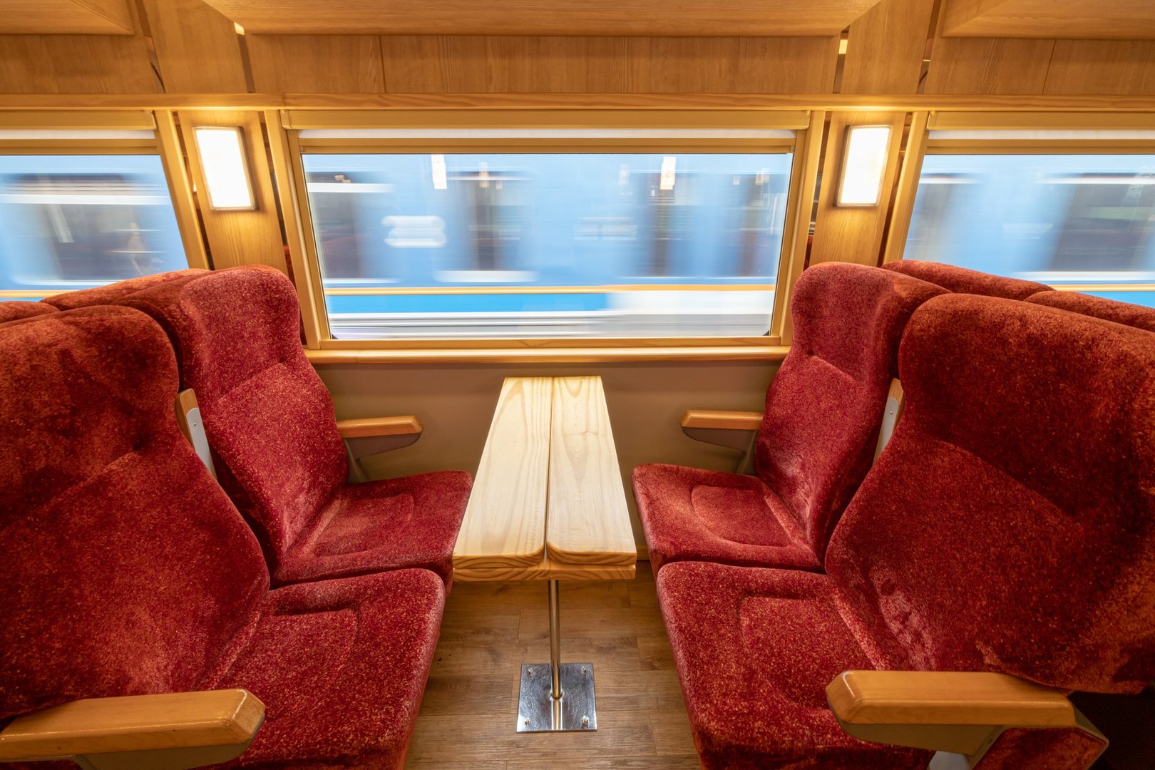 An interior of a shared cabin with a comfortable seat on the Thai railway from Bangkok to Ayutthaya Historical Park, Thailand.
