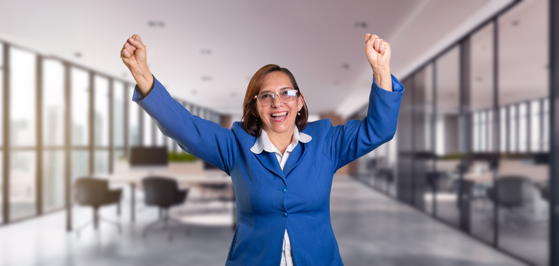 business concepts. Very happy and excited woman making a winning gesture with her arms raised. executive celebrating corporate success