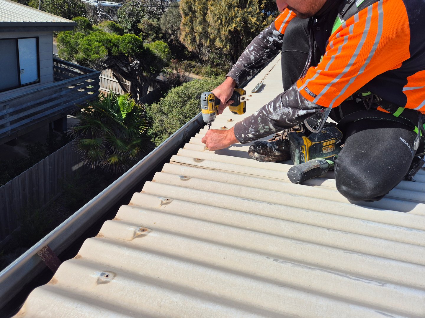 Screw replacement and roof preparation work by Quality Painting Group