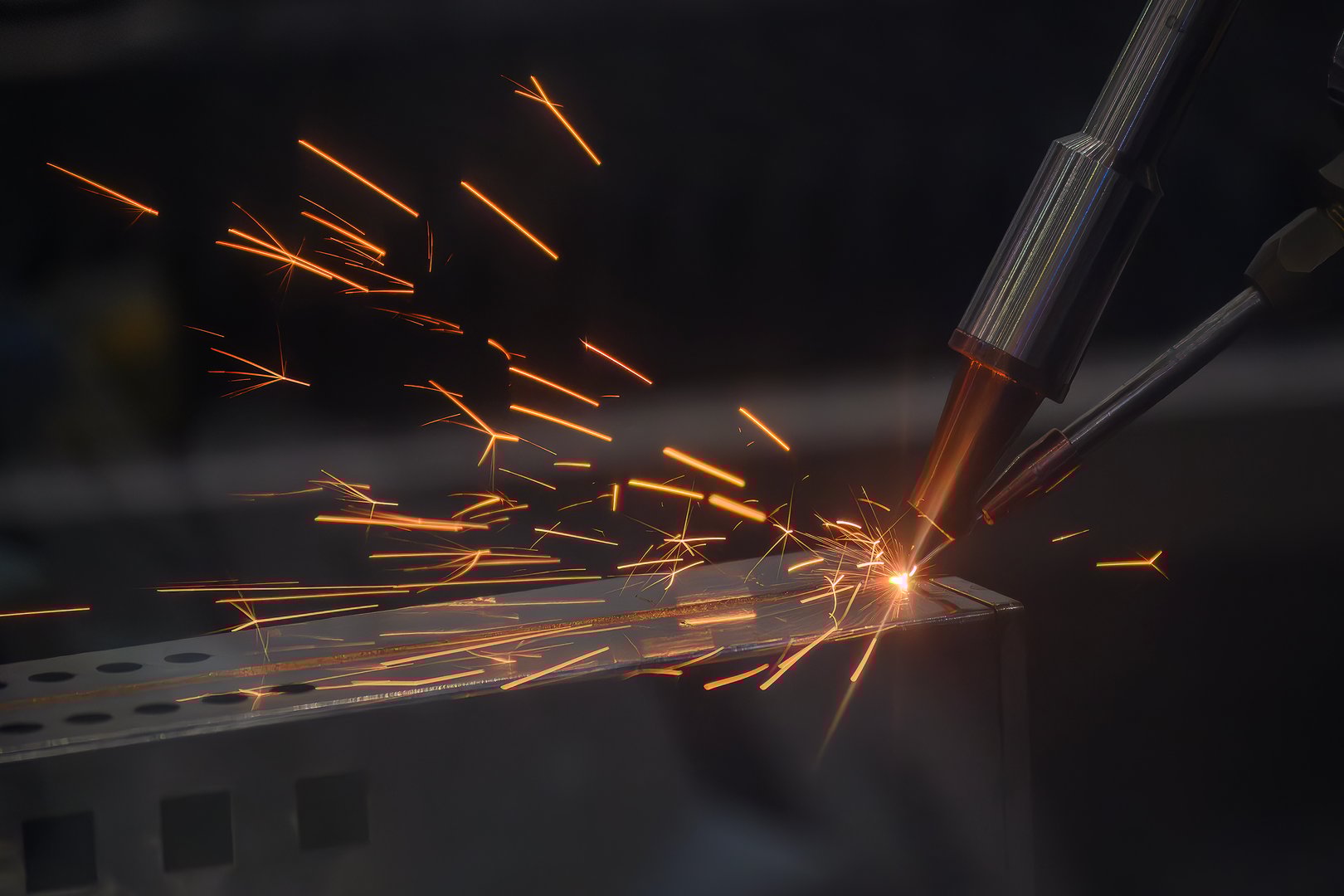 Close up scene the laser welding process by automatic system. The high technology welding process by laser welding machine.