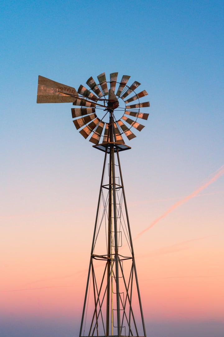 Countryside Farm Windmill with Sunset Sky