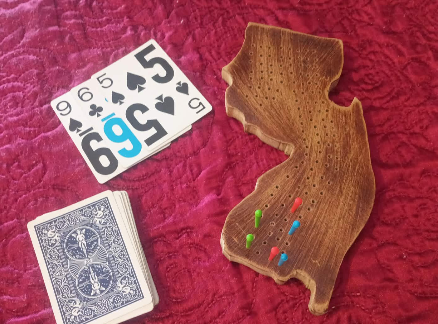 Hand-torched custom cribbage board