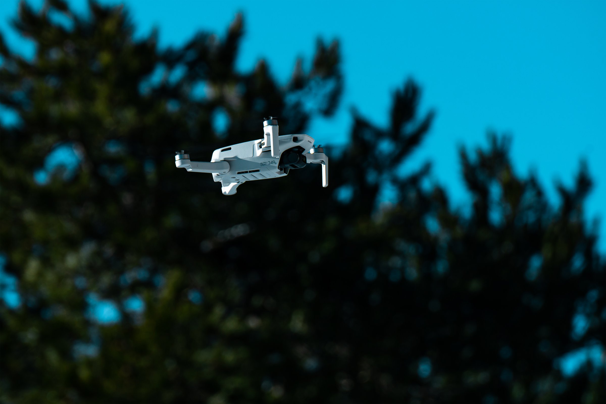Izmir, Turkey - February 10, 2022. DJI Mavic Mini 2 drone is flying on air. Editorial shot in Izmir.