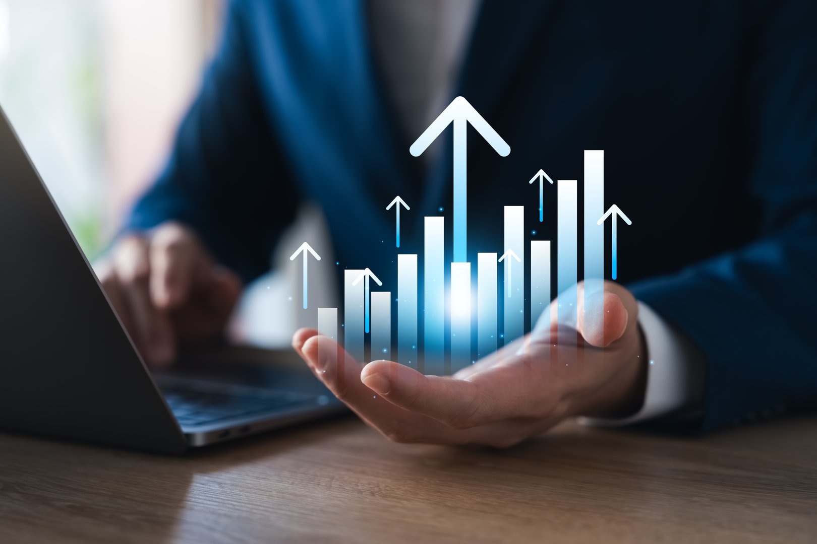 business growth chart Up arrow sign, businessman hands showing graph with up arrow, company growth Future successful business, development to achieve goals Return on investment.