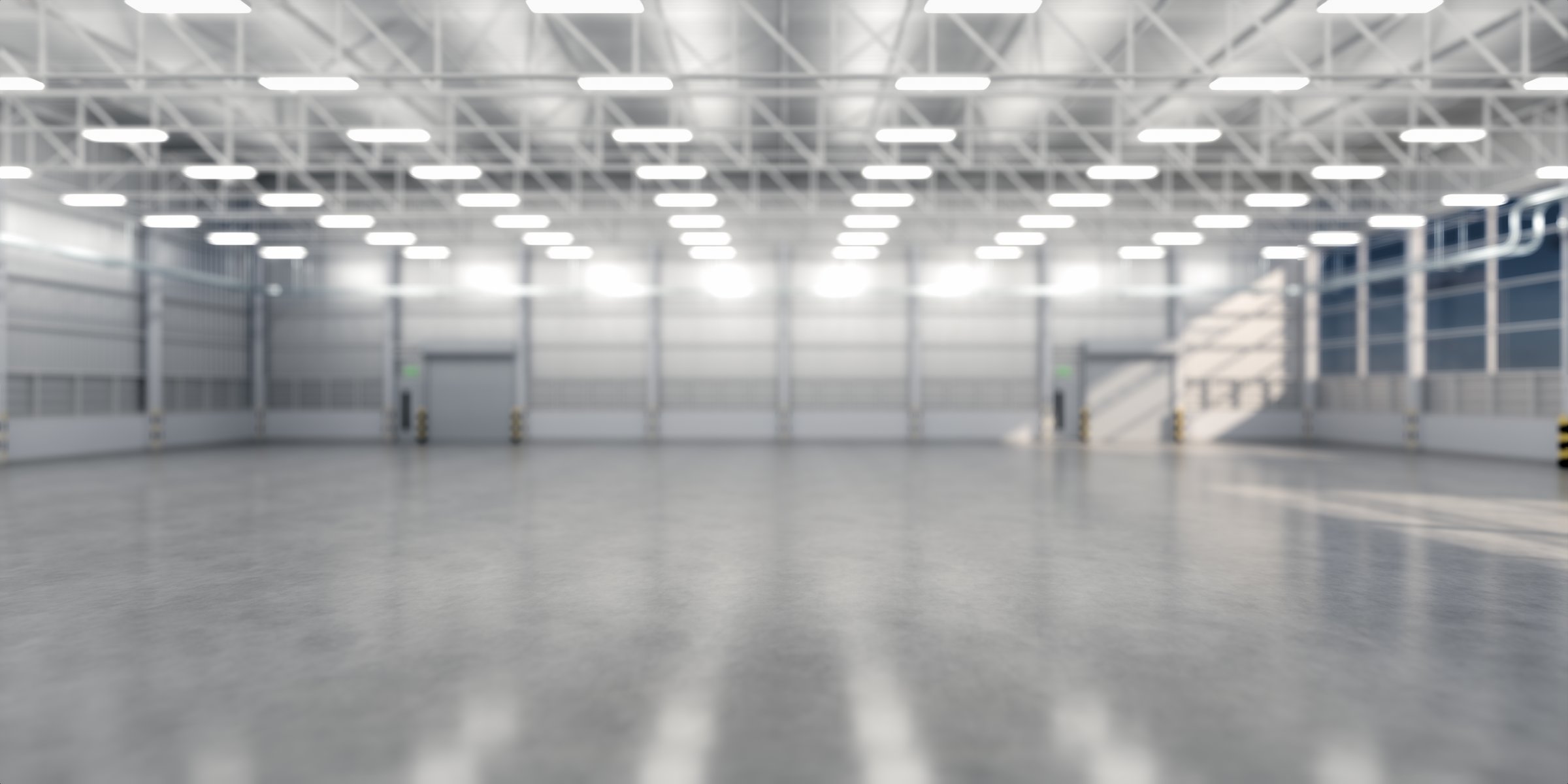 3d rendering of blur industry building interior. Construction by metal steel, concrete floor. Include shutter door or roller shutter, empty space. Modern factory, warehouse, hangar suit for background