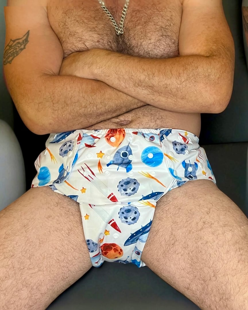 Comfort Haven premium waterproof adult diaper cover with adjustable snap waist band and leg openings featuring breathable PUL fabric in neutral tone for discreet protection