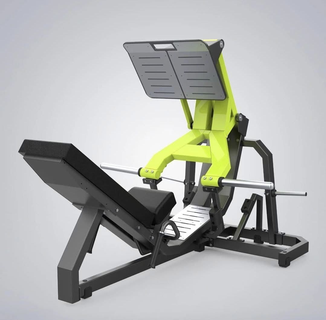 A green and black leg press machine with adjustable backrest and footplate, designed for gym workouts.