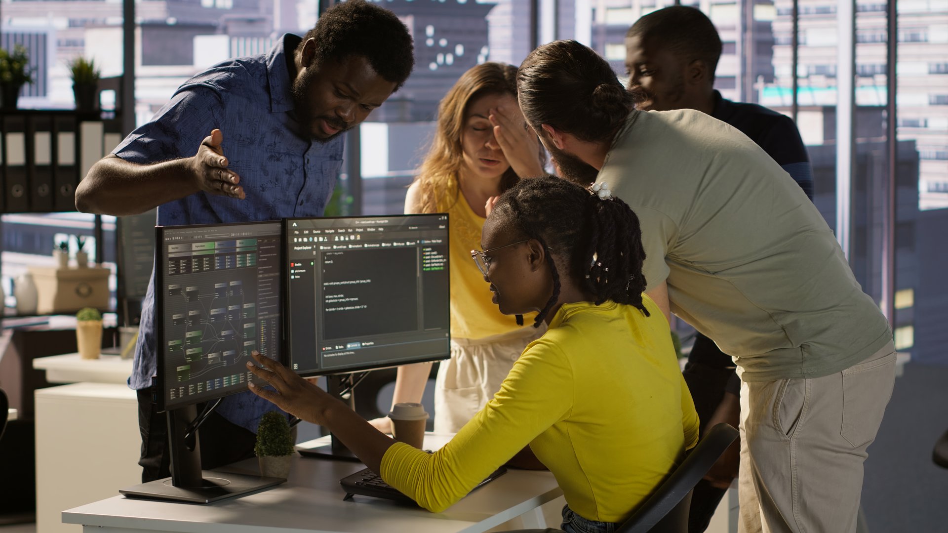 IT staff members arguing, having different ideas while testing and deploying programs and systems. Team of programmers fighting in office while checking code, having disagreement, camera A