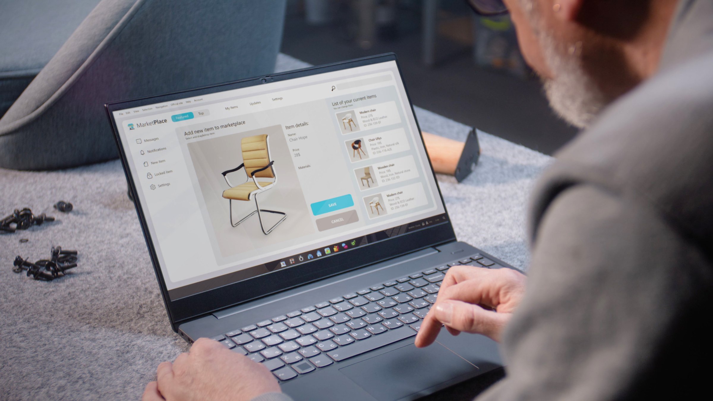 Craftsman uploads pictures of stylish wooden chair to online store using laptop computer. Small business owner adds photos of handmade products to the marketplace for sale. Entrepreneurship concept.
