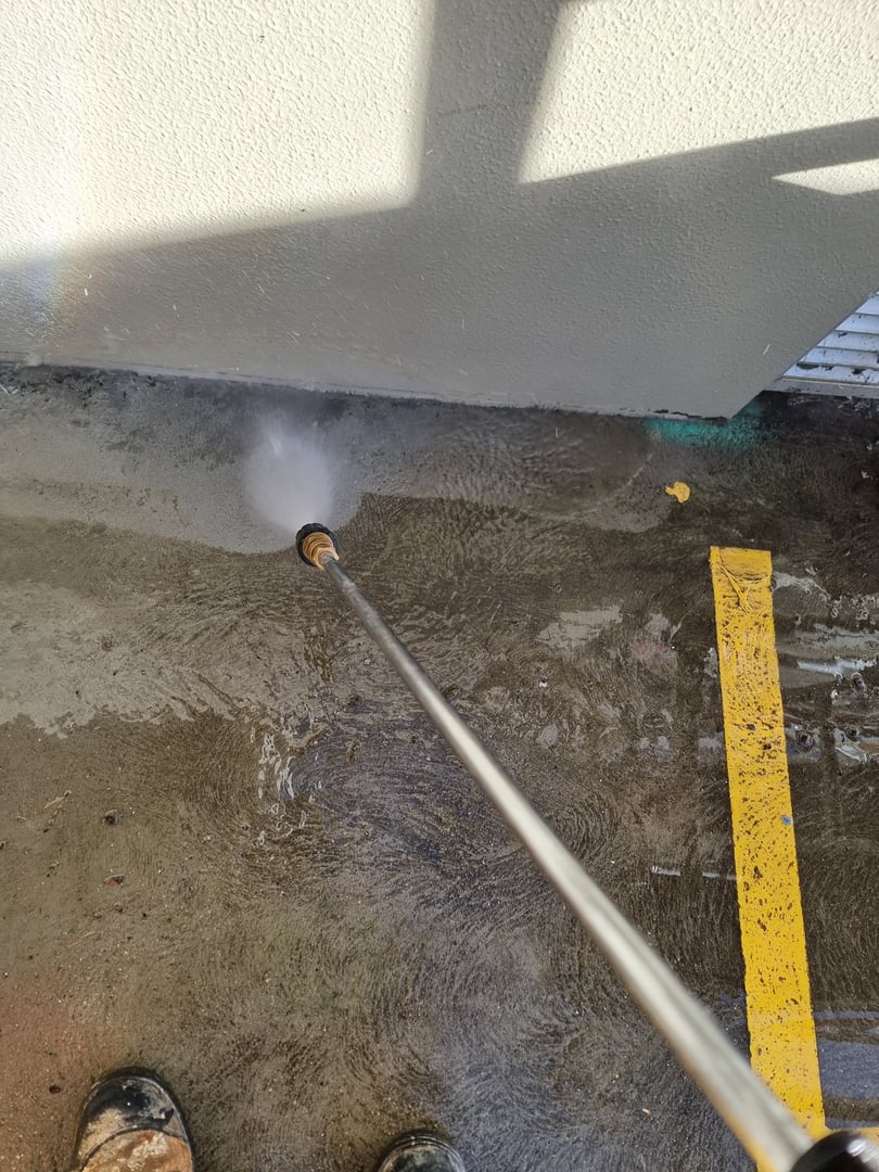 Quality Painting Group pressure washing work in progress