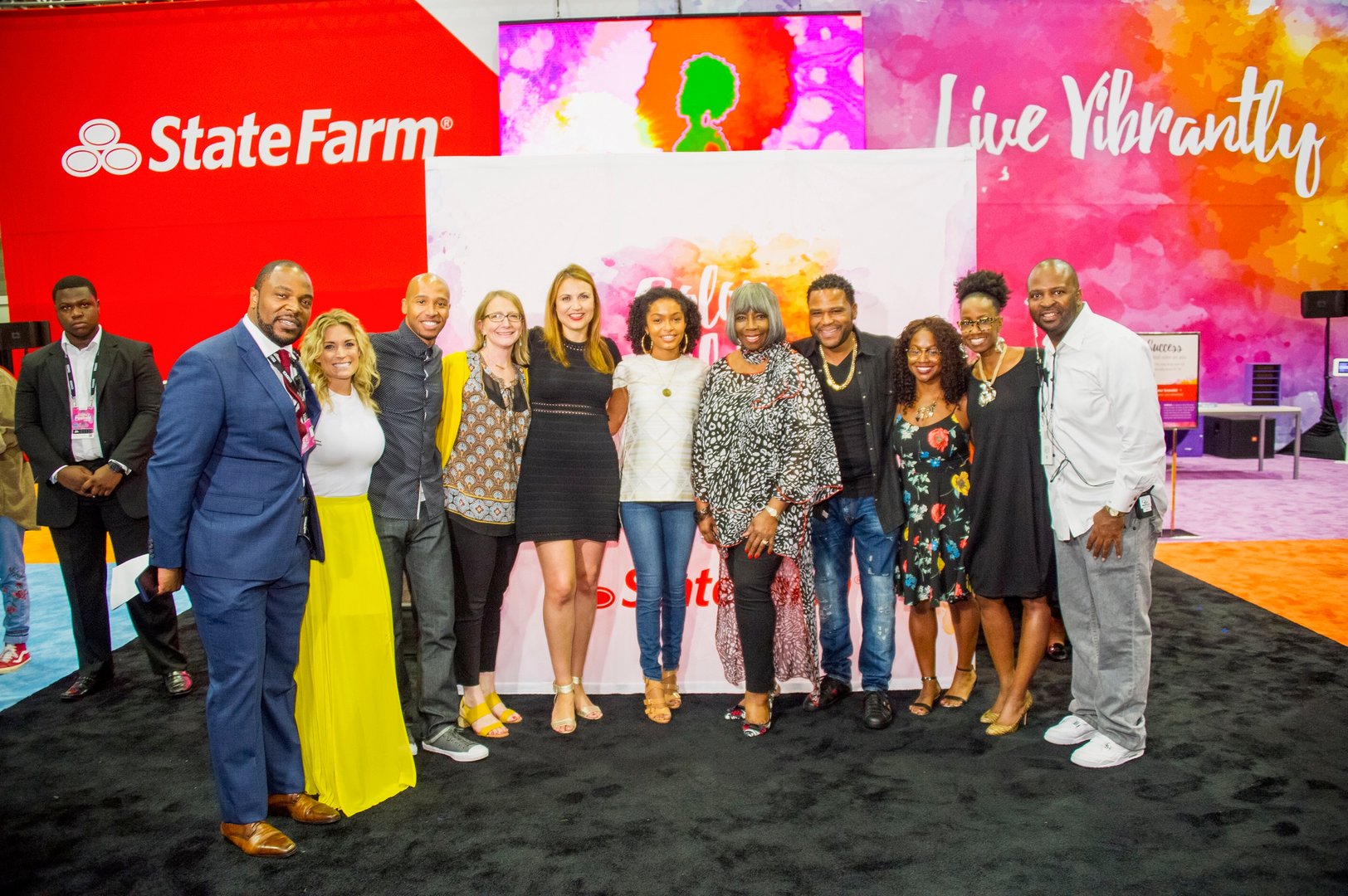 A dynamic office scene showcases hands engaged in a brainstorming session, with colorful sticky notes spread across a table, reflecting creativity and collaboration. SACTR