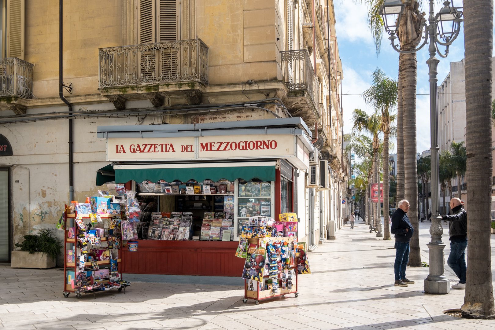 Brindisi, Italy - 2025, April 27 : A newsstand or kiosk on the Corso Umberto I in Brindisi with a publicity sign of the Newspaper of the South or Gazzetta del Mezzogiorno, Puglia, Italy