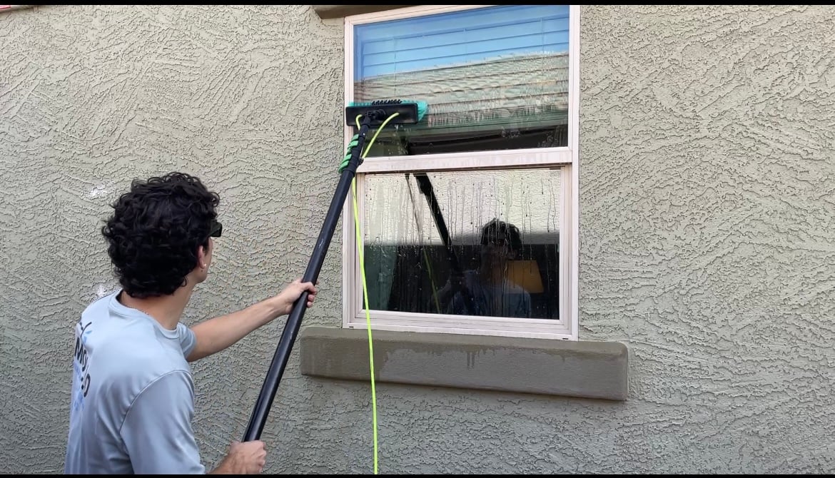 Mollo Window & Exterior Cleaning truck and team