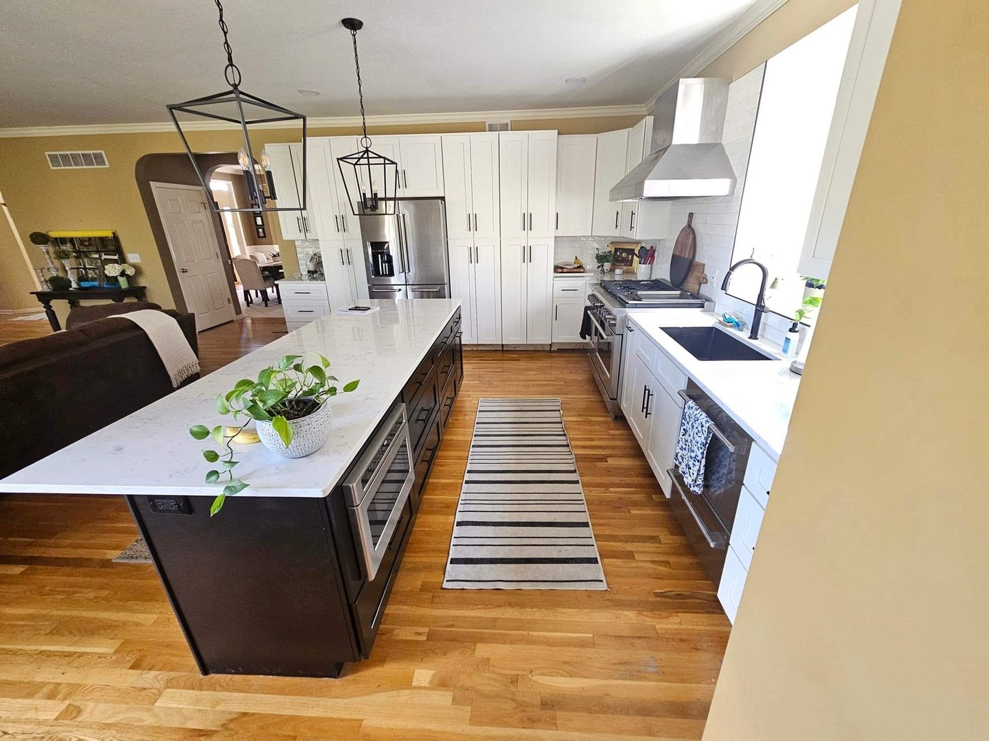 LVL beam installation for structural wall opening in Maumee home