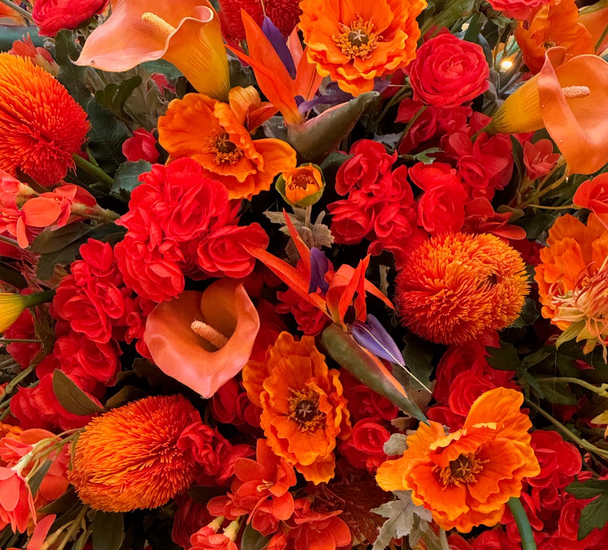 Orange theme of arranged flowers