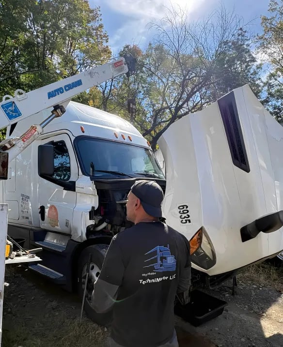 Asian male automotive technician who inspects, repairs, and maintains all vehicle systems,ensuring safe and optimal performance through expertise in engines, brakes, transmissions electrical systems