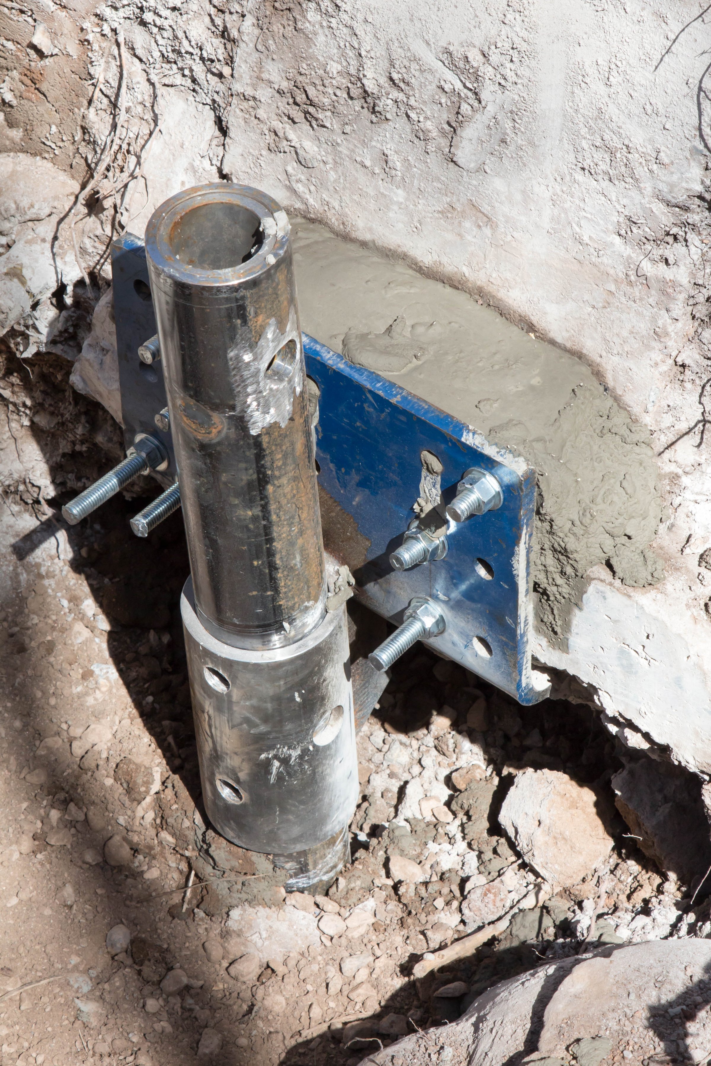 Helical pier foundation repair