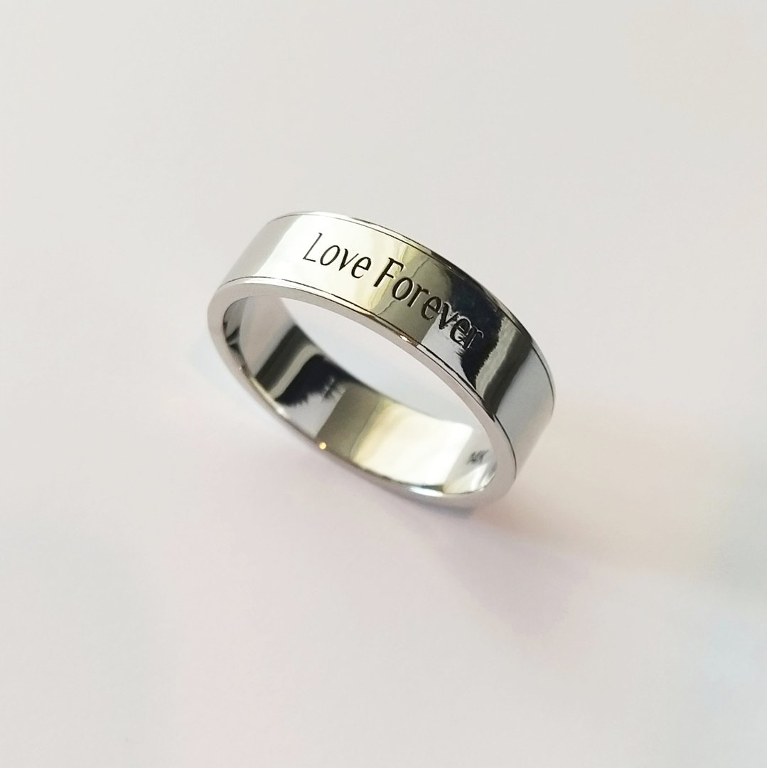 Wedding ring engraving with love forever message precision jewelry