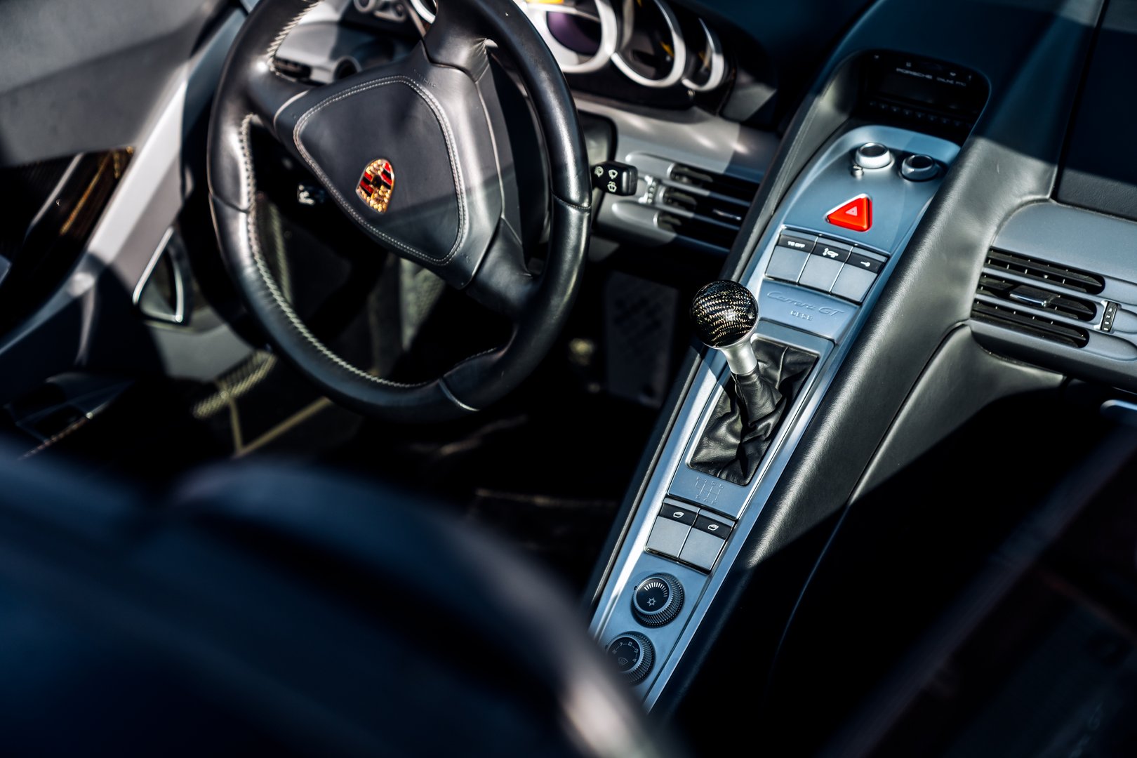 LA, CA, USAMarch 29, 2025Porsche Carrera GT parked showing the steering wheel