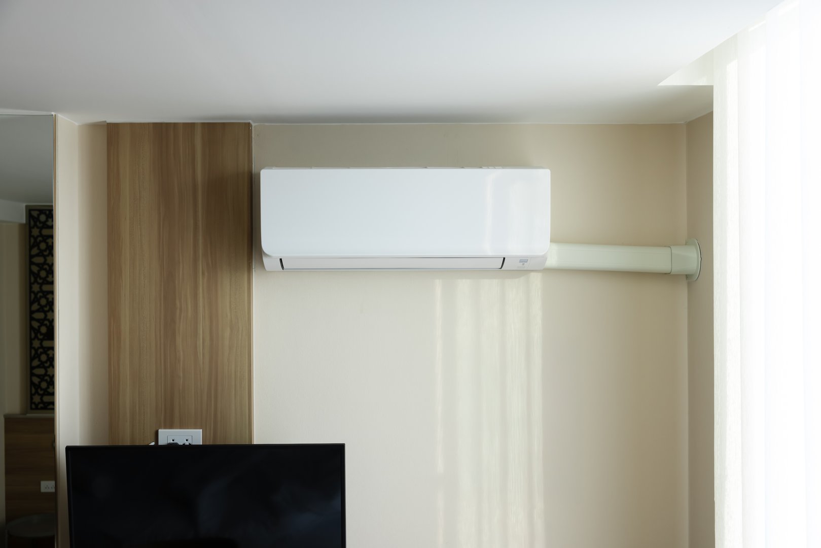 Air conditioner wall mount indoor unit. Part of air conditioning HVAC split system for climate, temperature and humidity control. To cool or cold in room of home building.