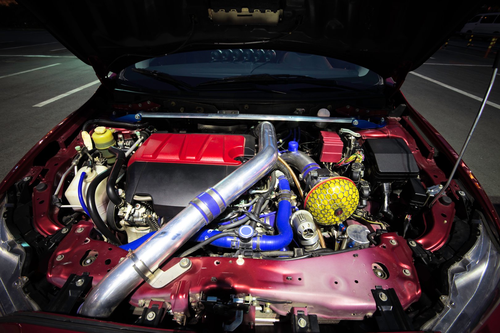 customized car's red turbo engine