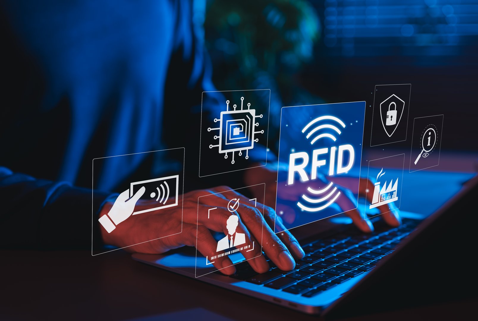 RFID Technology Concept. Radio Frequency Identification. Person using laptop with digital icons illustrating RFID tech, data chips, access control, security systems for smart industrial applications,