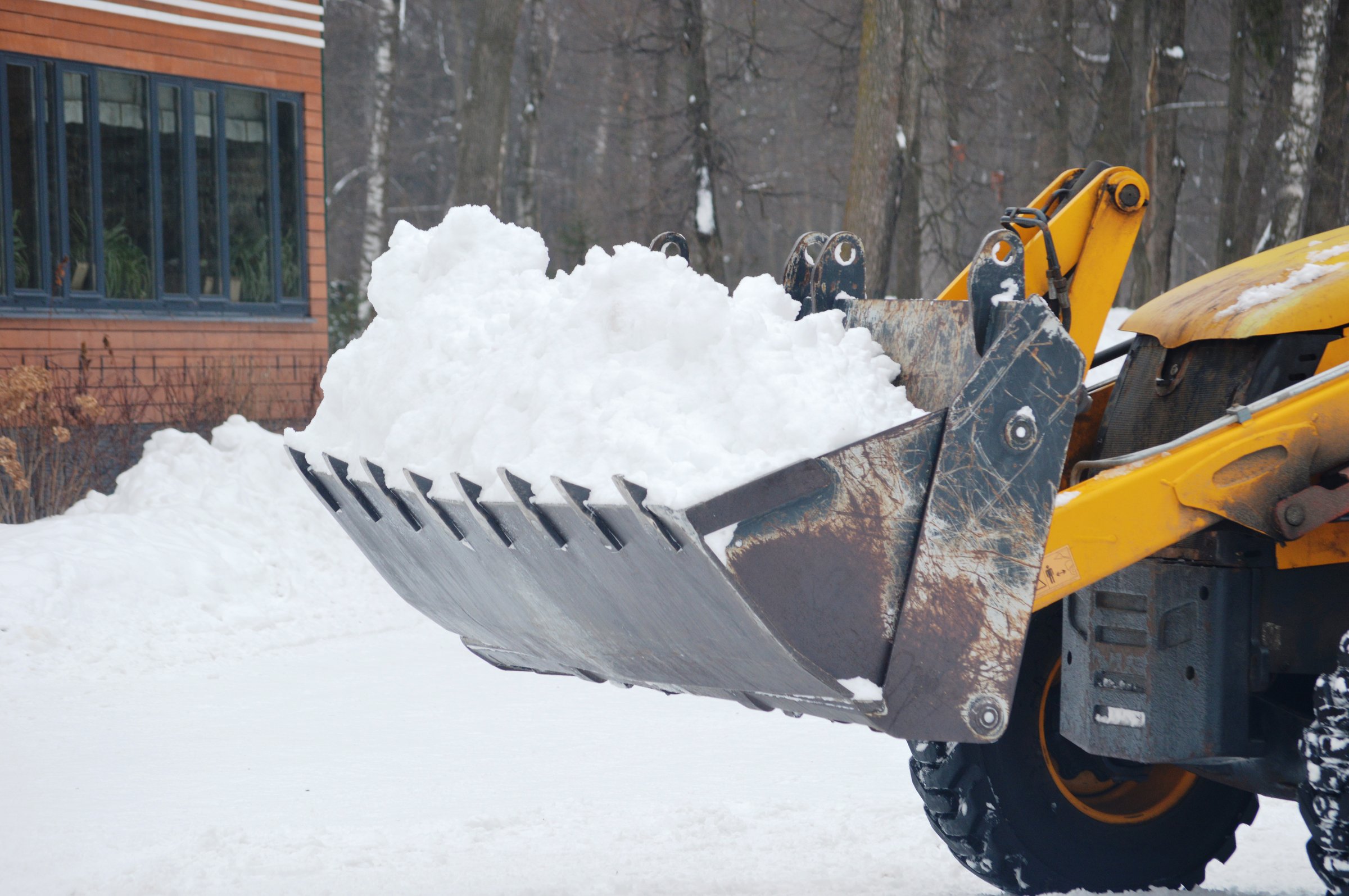 process of snow removal using mechanized machines