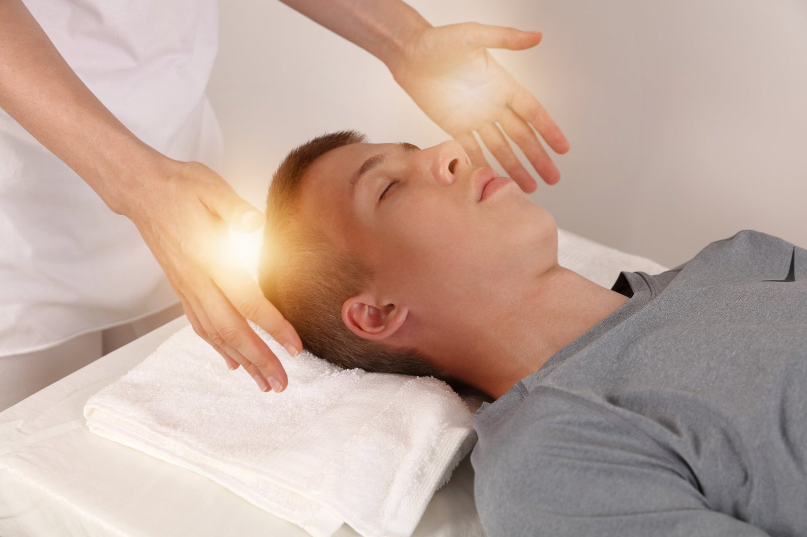 Energy healing treatment, alternative medicine, holistic care, healing hands concept.
