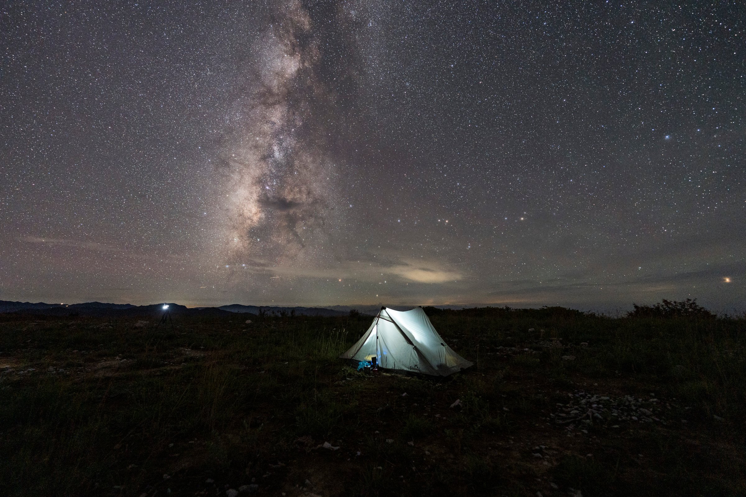 Camping under the beautiful starry sky and Milky Way at night