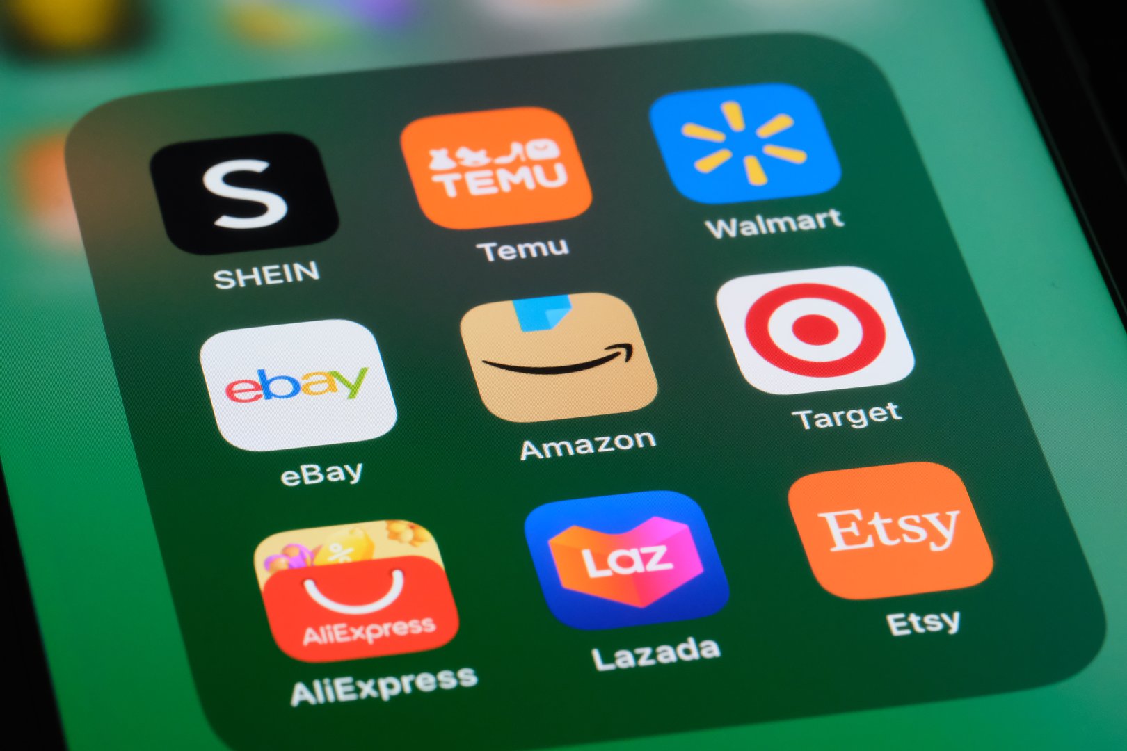 Shanghai,China-June 13st 2023: Amazon, eBay, SHEIN, Temu, Walmart, AliExpress, Lazada, Target and Etsy app icon on screen. Assorted e-commerce company and brand logo