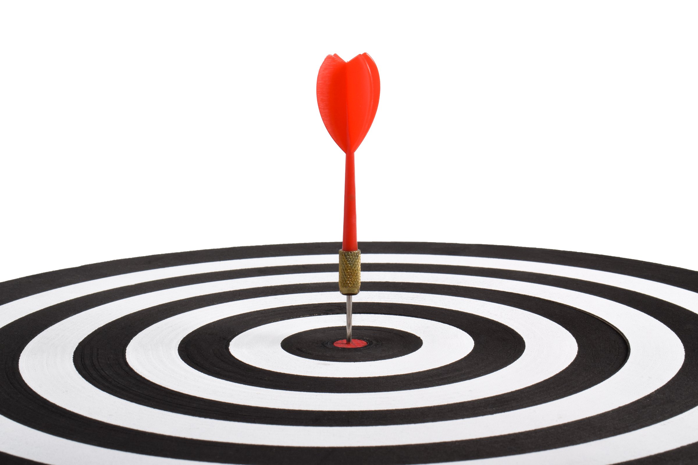 Red arrow hitting target on dart board isolated on white background