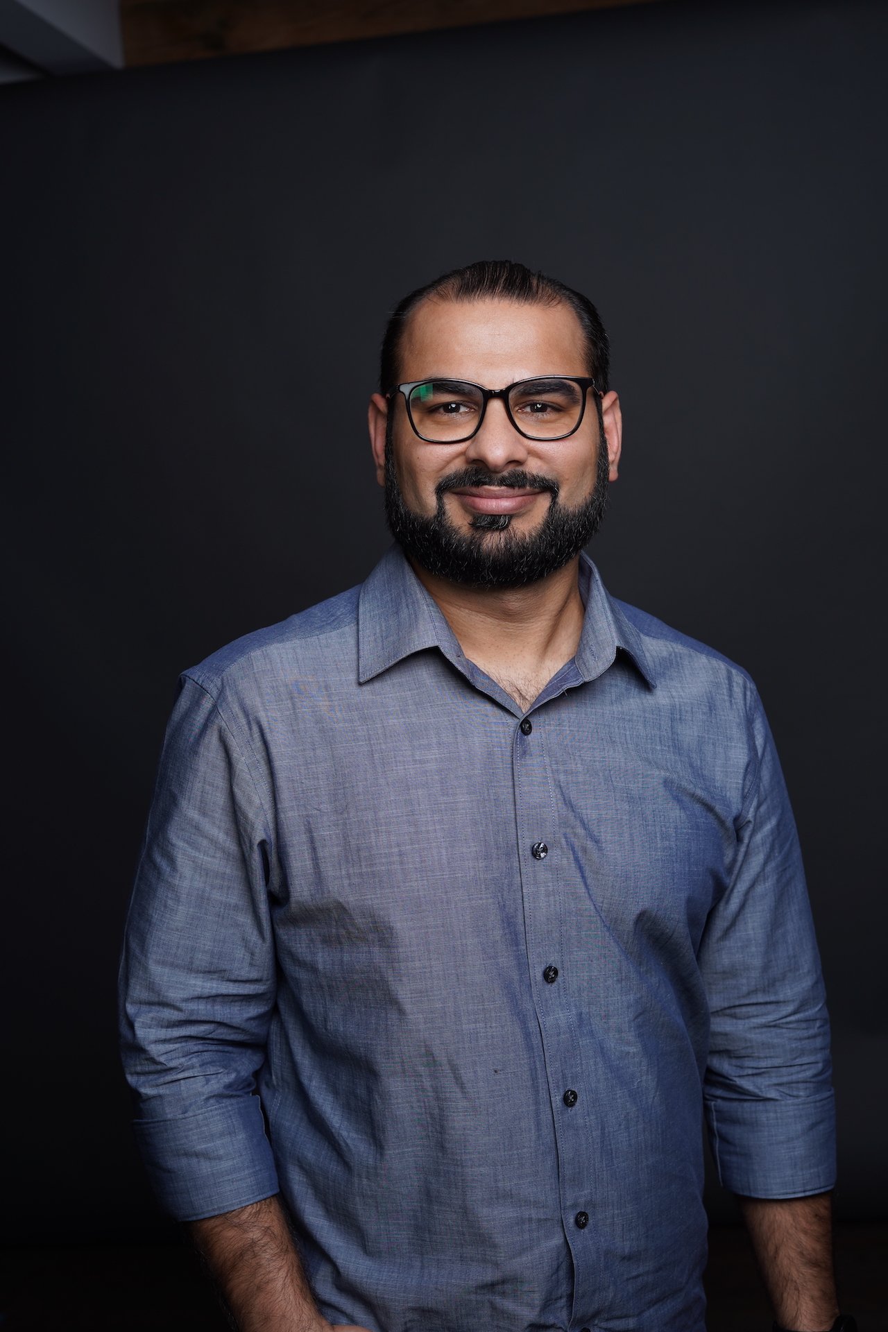 Professional headshot of Farjad Syed