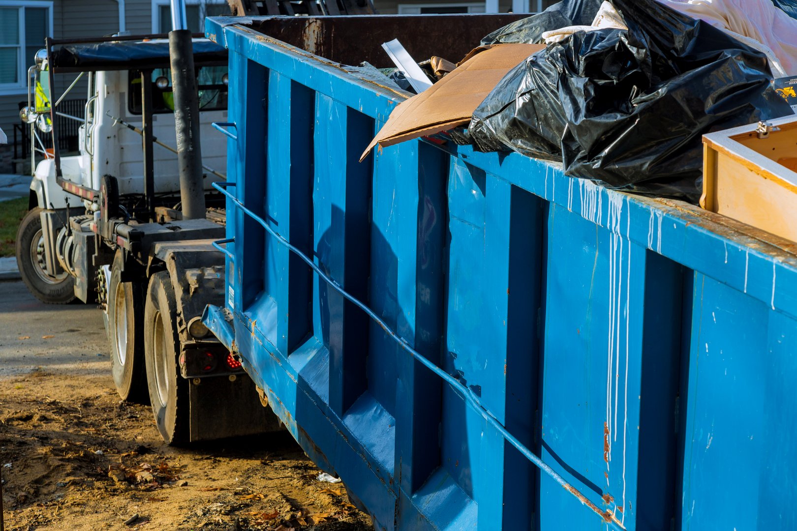 Loading the garbage container construction material