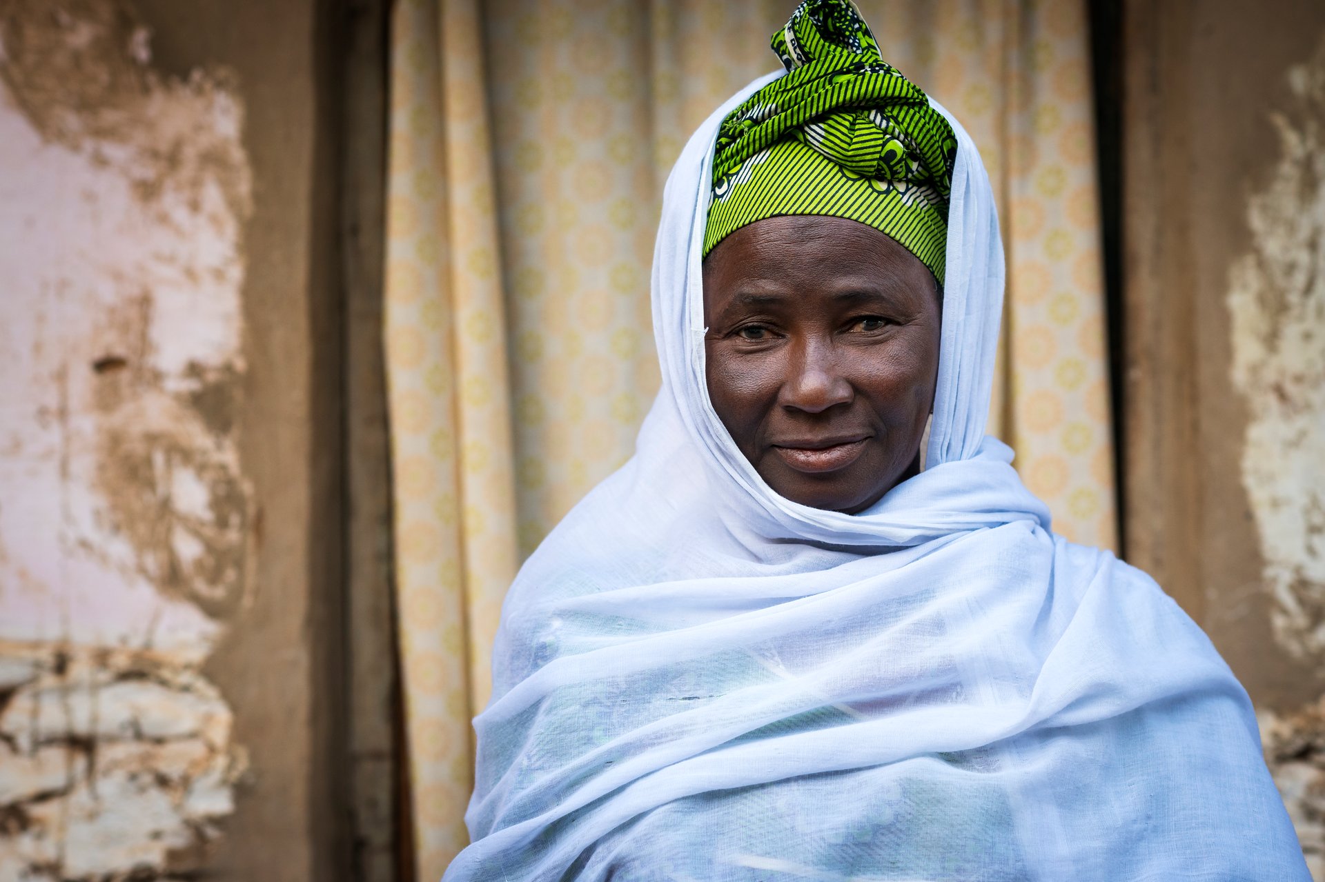 Bissau, Republic of Guinea-Bissau - January 29, 2018: Portrait of an African woman wearing a hijab in a slum of the city of Bissau, in Guinea-Bissau, West Africa