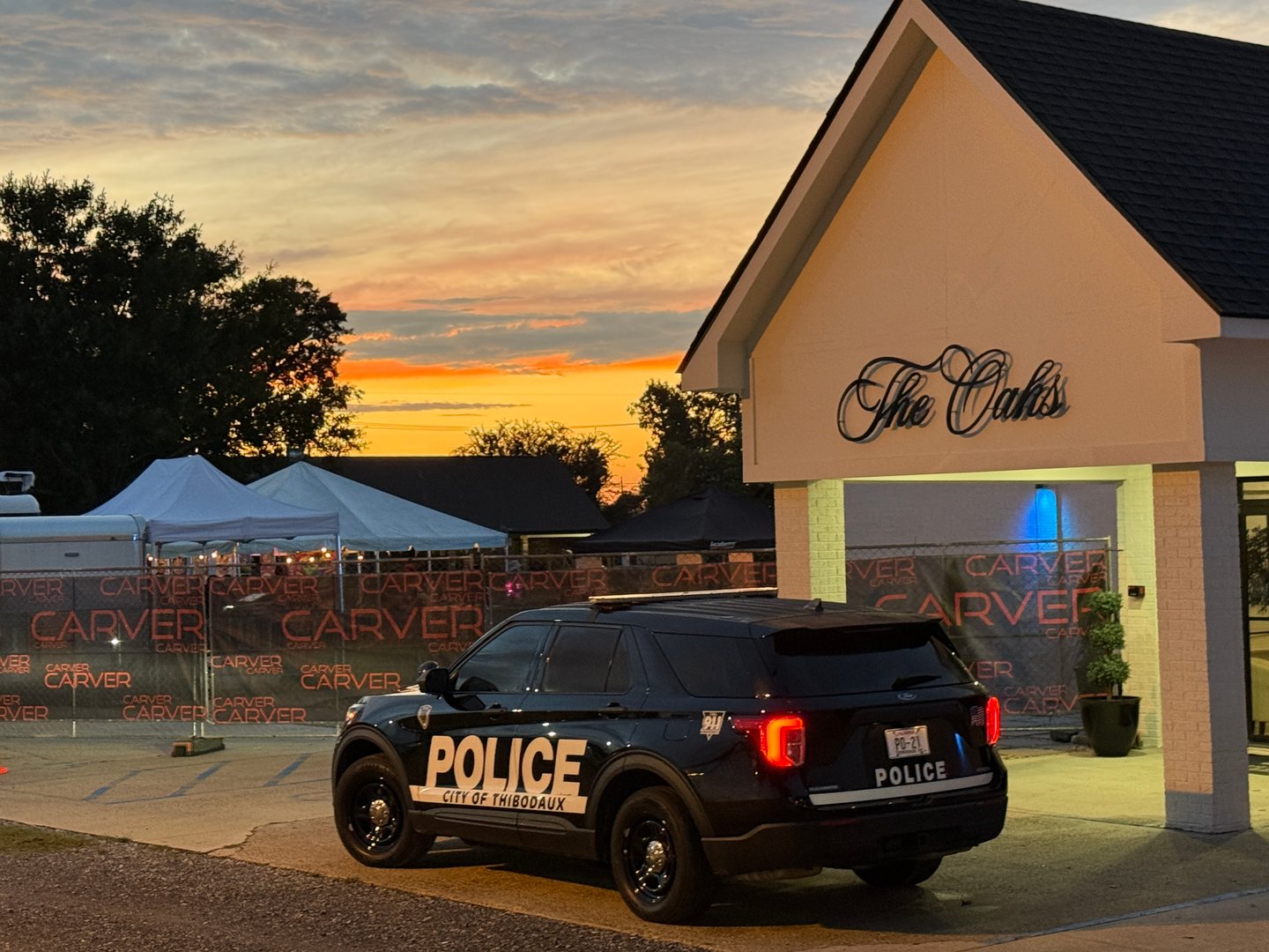 Police vehicle coordination with Carver security fencing